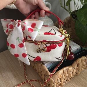 Cherry Mini Bucket Crossbody Bag with matching bag scarf and charm